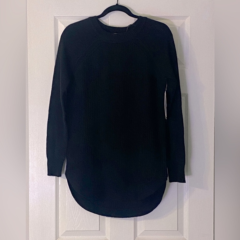 Cotton blend crew neck sweater.